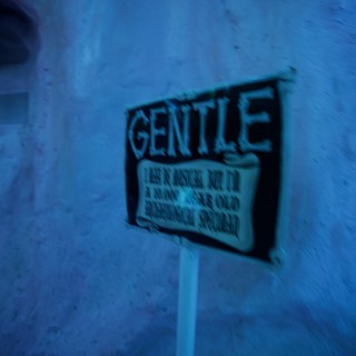 Vintage Gentle Sign in Blue-Tinted Atmospheric Scene