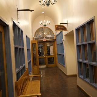 Historic Santa Fe Hotel Corridor with Vaulted Ceiling