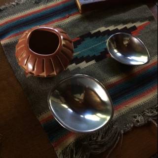 Table Setting with Pottery Bowls and Vase