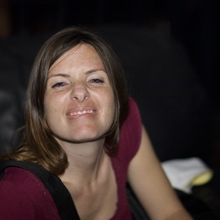 Candid Smile at a Night Venue Event