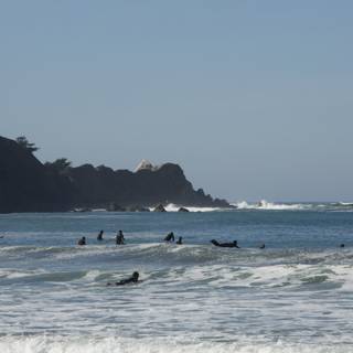 Pacifica Surfers Catching Waves