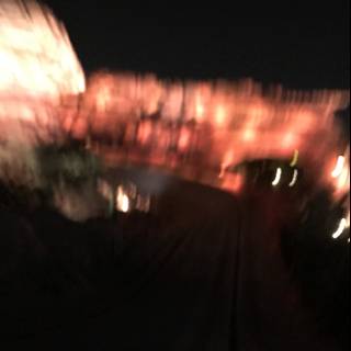 Blurred Train under Night Sky