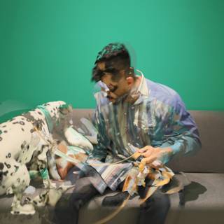 Man and his Dalmatian on the Couch