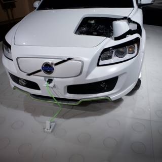 White Car with Green Cord