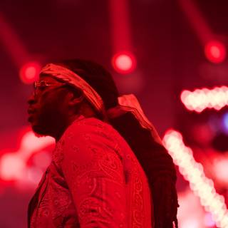 Solo Entertainer in Red Headband Captivates Coachella Crowd