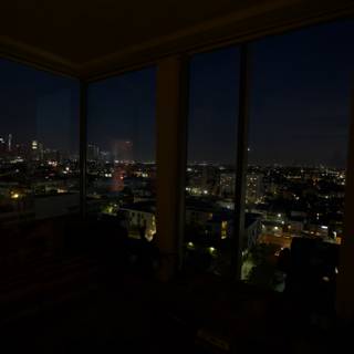 Nighttime Cityscape View from a Penthouse Window in Los Angeles