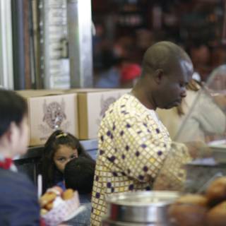 A Man Enjoying Lunch at the Food Court