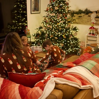 Family Christmas Morning in Matching Pajamas