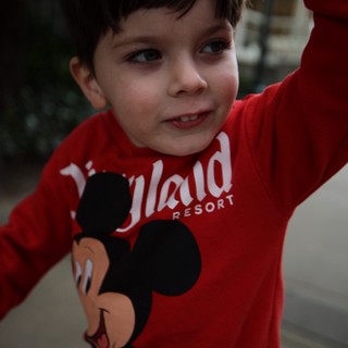 Young Boy in Mickey Mouse Disneyland Sweatshirt
