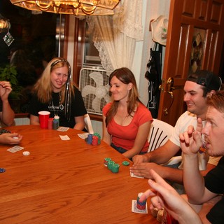 Friends Enjoy Late Night Home Poker Game