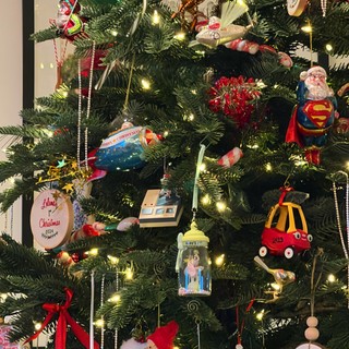 Eclectic Christmas Tree Filled with Personal Ornaments and Memories