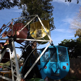 Vintage Ferris Wheel Ride at Fantasyland Amusement Park