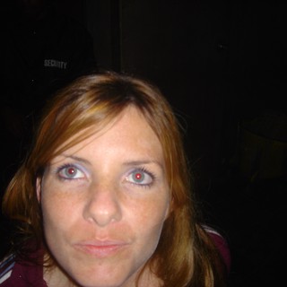 Candid Portrait with Red-Eye in Dark Venue