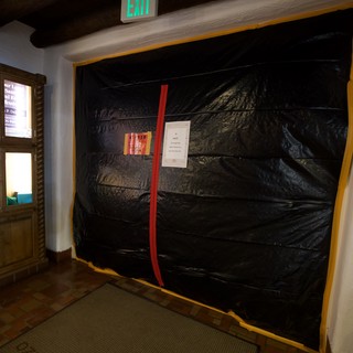 Black Draped Doorway with Red Accent Stripe