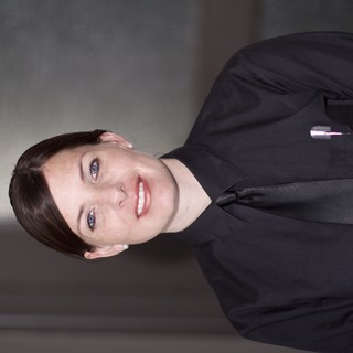 Professional Woman in Black Uniform Portrait 2006