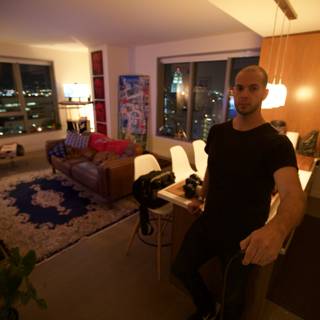 Man in a Modern Living Room Overlooking the City