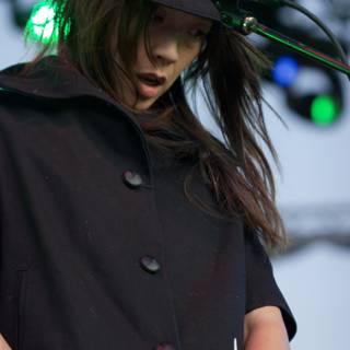 Kazu Makino Performing in Black Coat