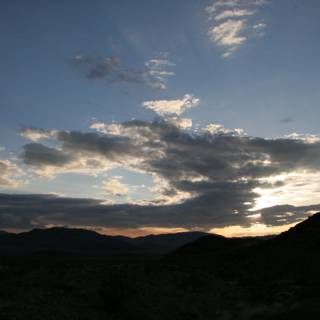 Desert Sunset: A Melange of Mountains and Clouds