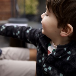 Young Child Engaged in Screen Time at Home
