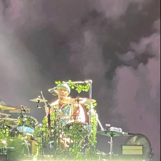 Green Hat Drummer Rocks the Stage