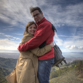 Couple Embracing Atop Berkeley Hills Overlooking Bay