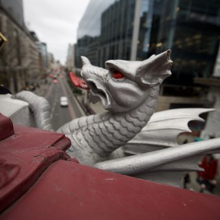 Silver Dragon Guardian Overlooking London Street