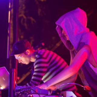 DJ Duo on Stage with Laptops