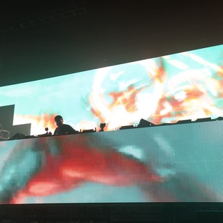 DJ Silhouette Against Massive LED Stage Display