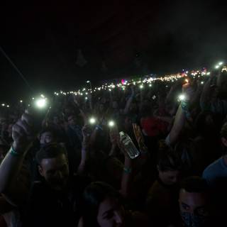 Concertgoers' Phones Light Up the Night Sky