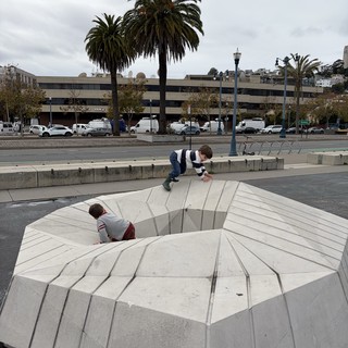 Children Playing on Sunken Circular Plaza Amphitheater