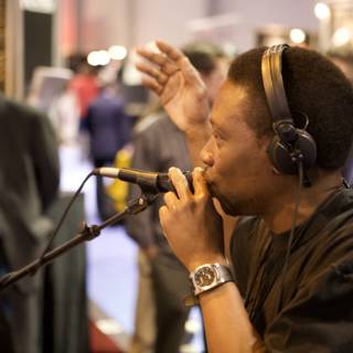 Musician Performing with Headphones and Microphone