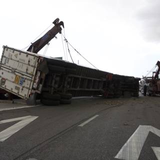 Overturned Truck Lifted Off Tarmac
