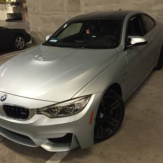 BMW M4 parked in LA garage