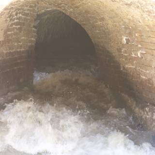 The Water-Flowing Sewer Tunnel