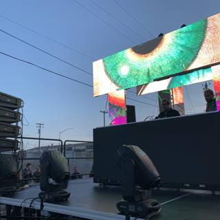 Diplo performing on the high-tech stage