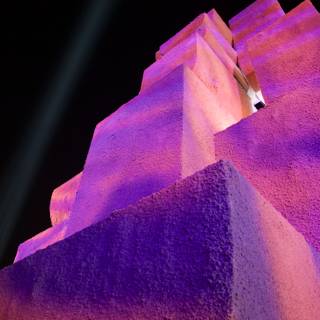 Purple Hues of Night: An Illuminated Fortress