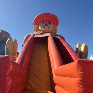 Giant Inflatable Clown Slide at Outdoor Event