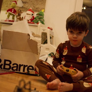 Boy Playing with Remote Control Toy on Christmas Morning