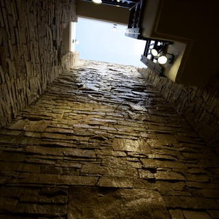 Ancient Stone Stairway Leading to Light Above