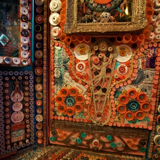 Intricate Folk Art Installation with Buttons and Found Objects