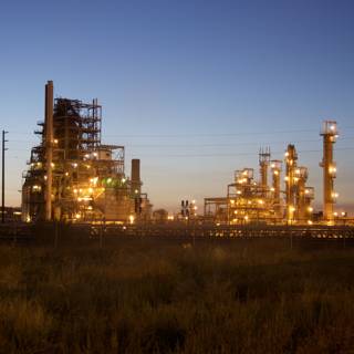 Silhouette of a Refinery at Dusk