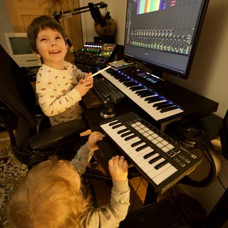 Young Musicians Creating Music in Home Studio