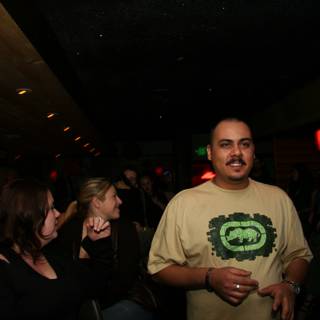 Man in Yellow Shirt at Nightclub