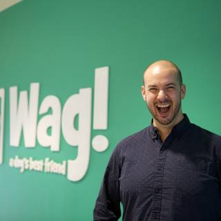Dave B posing with WAG logo