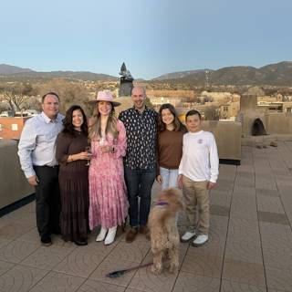 Family Fun on a Rooftop with Their Furry Friend