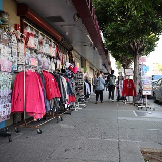 Street Market Shopping District with Colorful Clothing Displays