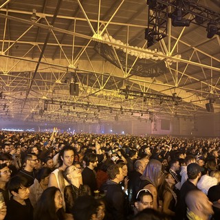 Massive Crowd at Indoor Electronic Music Festival