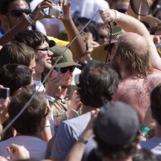 Coachella Crowd Dons Colorful Headgear and Sunglasses