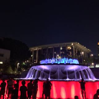 Nighttime Gathering at Civic Center Fountain