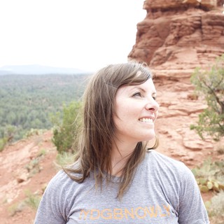 Woman Smiling Amid Sedona Red Rock Formations